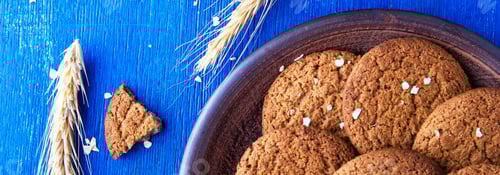 Preview: Delicious Oatmeal Cookies with Grain on Rustic Blue