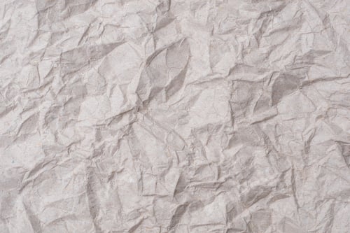 Preview: Gray crumpled KI kraft paper texture background.