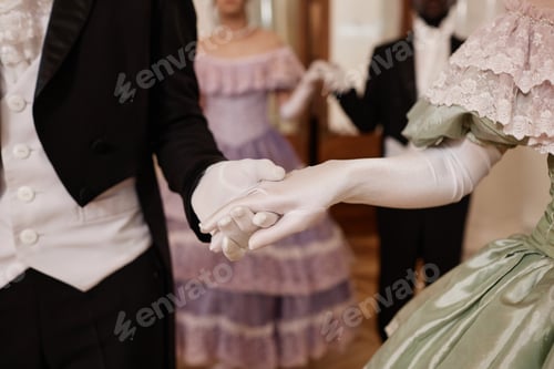 Preview: Lady and Gentleman Holding Hands Wearing Gloves
