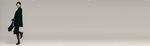 Preview: Woman in Black Jacket Poses With One Leg Up