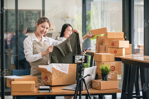 Preview: Small start-up business owners live online sales at work, salespeople, check production orders. Pack