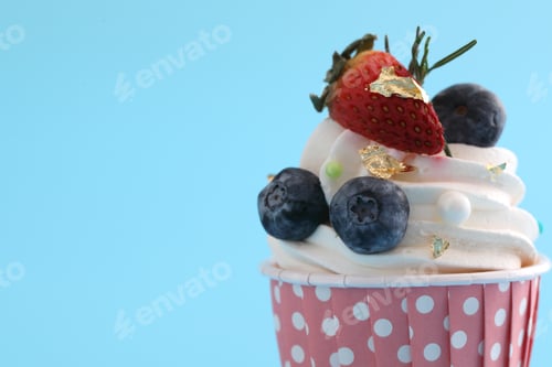 Preview: Fruits Cupcake Isolated In Blue Background