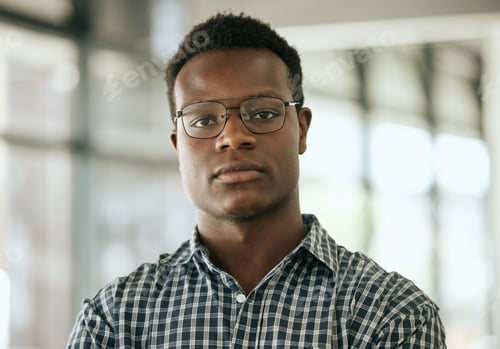 Preview: Portrait of a confident young professional african american business man with glasses standing in a