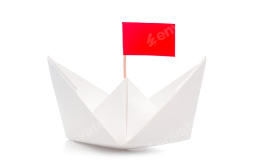 Preview: Paper boat with red flag floating on a white background in simple craft