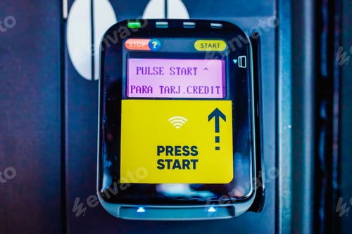 Preview: Valencia, Spain - October 2, 2021: A digital collection card reader, with the text Press here