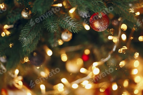Preview: Beautiful stylish christmas tree with garland lights and golden ornaments