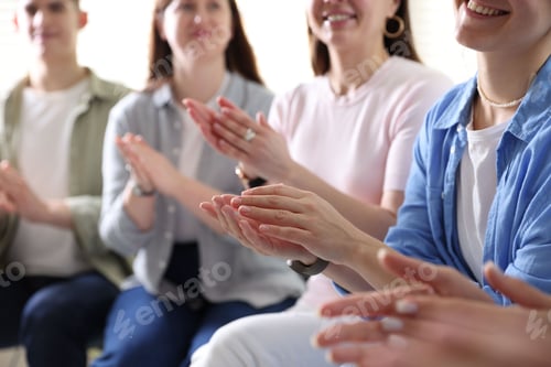 Preview: People applauding during meeting indoors, closeup view