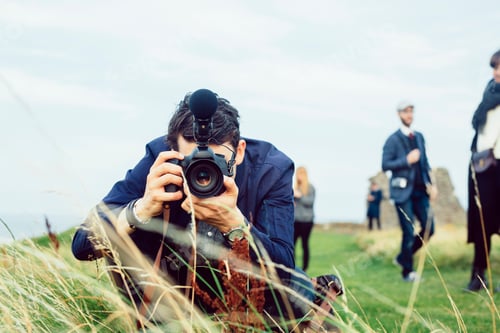 Preview: Photographer capturing the moment in a vibrant outdoor setting