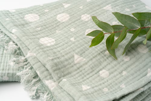 Preview: Green muslin blanket for kids on white background