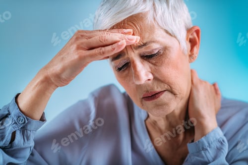 Preview: Senior Woman with Intense Migraine Headache Pain.