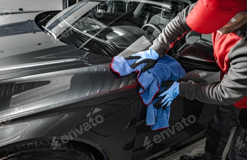 Preview: Automotive Worker Taking Care of a Car Body.