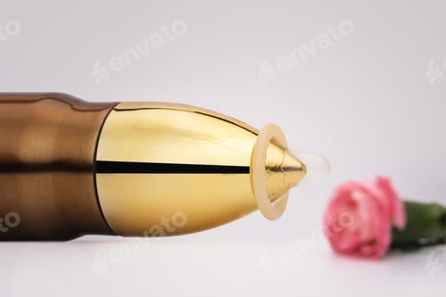 Preview: Make love, not war. Pacifism and non-violence movement. Bullet with a condom on the top.