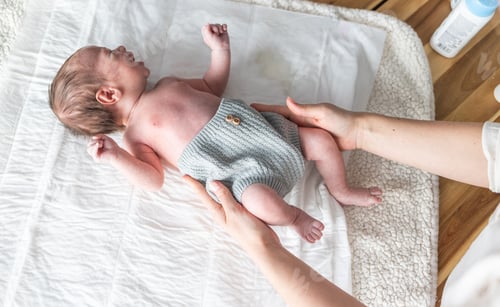 Preview: Dressing newborn baby on changing table