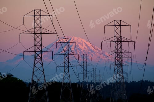 Preview: Electricity pylons near mountain landscape