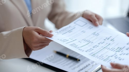 Preview: New graduate women fill out the human resources department application form review and prepare your