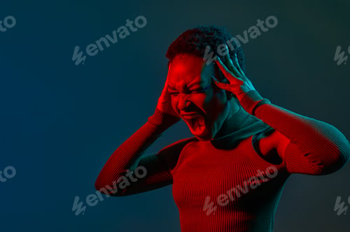 Preview: Headshot portrait of young woman shouting