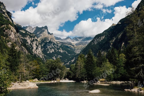 Preview: view of the alpine lake Qualido in the Mello Valley surrounded by granite mountains