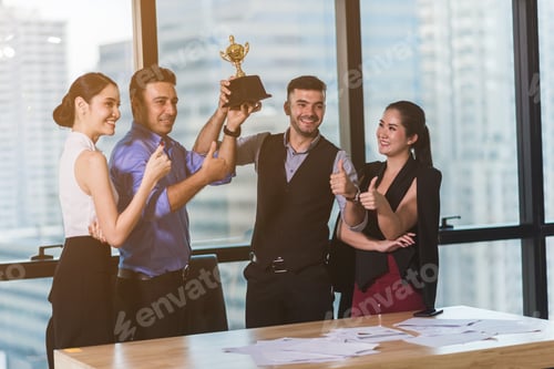 Preview: A group of business people celebrating the joy of business success