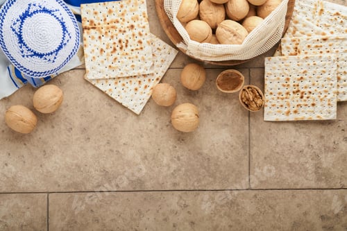 Preview: Passover celebration concept. Matzah, red kosher and walnut. Traditional ritual Jewish bread matzah,