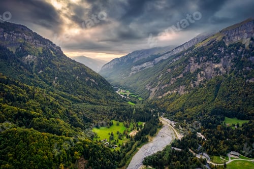 Preview: French Alps landscape of Giffre valley mountain range in the sunset at Sixt Fer a Cheval, France