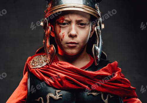 Preview: Child dressed in legionary clothing poses in dark background
