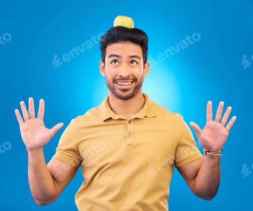 Preview: Comic, Asian man and balance apple on head for comedy, trick or a show. Happy, young and a person w