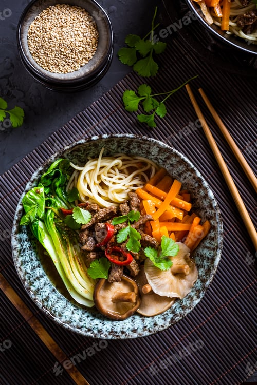 Preview: Asia style ramen soup with udon noodle, beef, shiitake, pak choi cabbage and carrots