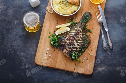 Preview: Baked flatfish with potato gratin and beer, copy space