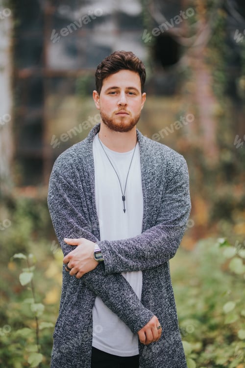 Preview: Shallow focus shot of a young and attractive male posing at camera