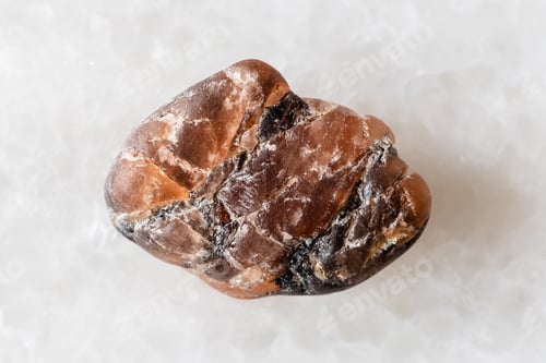 Preview: sample of rawtriplite mineral on white marble