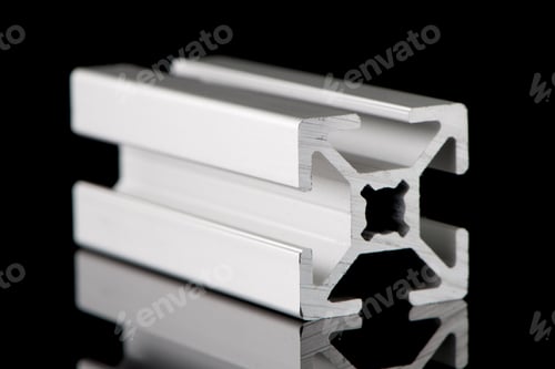 Extruded Aluminum Profile on Black Reflective Surface