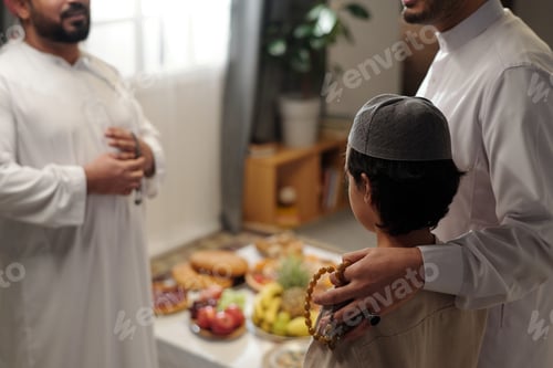 Preview: Unrecognizable Muslim Father And Son At Family Gathering