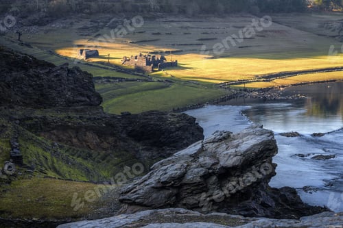 Preview: Remains of Old Houses Submerged in a Reservoir