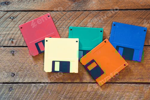 Preview: Five different colored flopy disks as used in the 1980s and 1990s