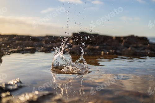 Preview: Macro shot of the water splash in the rock pool