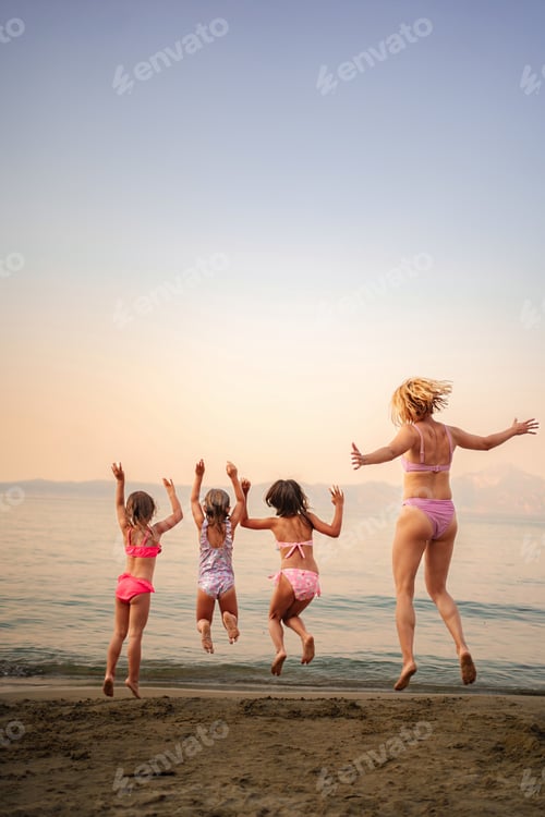 Preview: Joyful family moments at the beach during a sunny afternoon