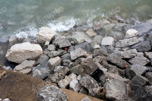 Preview: Lake Water Hitting The Rocks On A Cold Winter Day