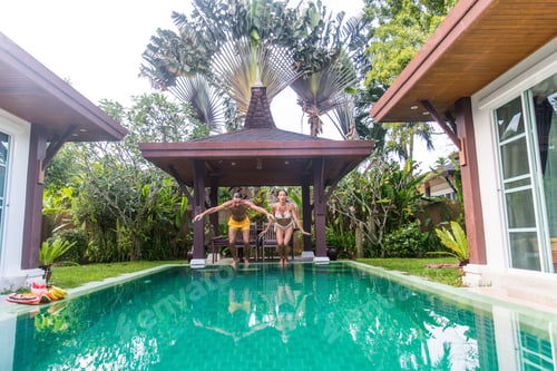 Preview: Couple of lovers in a beautiful villa with swimming pool