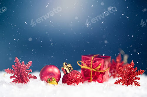 Preview: Red Christmas decoration on blue background in sparkling holiday lights.