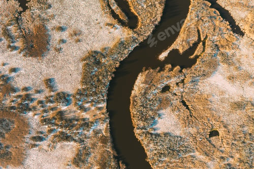 Preview: Belarus. Aerial View Of Dry Grass And Curved River Landscape In Early Spring Day. High Attitude View