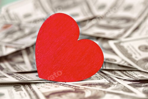 Preview: red heart stands on money one hundred dollars