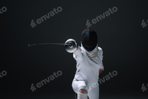 Preview: Fencer holding rapier while training isolated on black