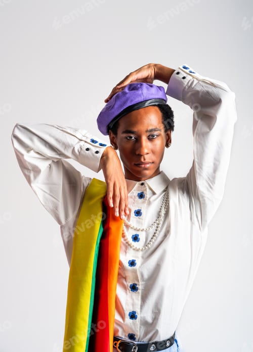 Preview: Fashionable fluid gender man posing in studio