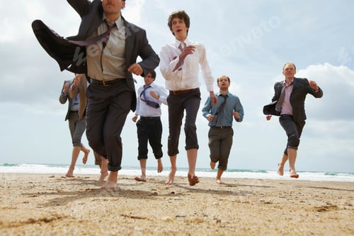 Preview: Businessmen running on beach