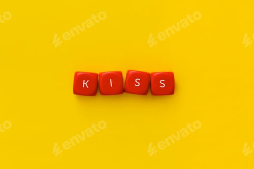Preview: The word "Kiss" on a red cubes