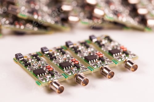 Preview: Close-up of four small microcircuits PCB