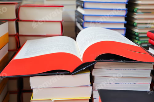 Preview: open book on table. back to school