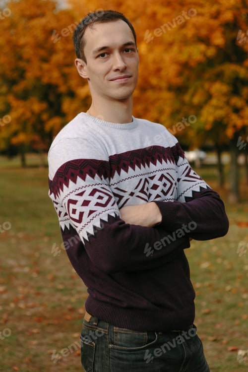 Preview: Handsome Guy In A Sweater In Autumn Park