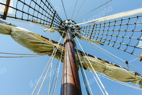 Preview: Mainmast and rope ladders to hold the sails of a sailboat.