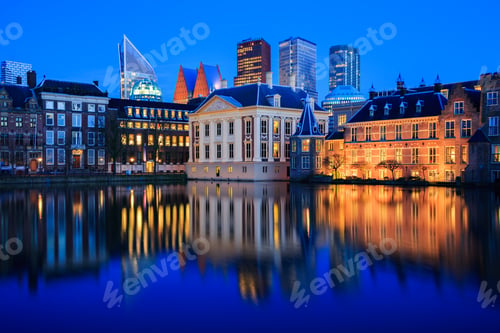 Preview: The skyline of the Hague and a lake at Blue Hour